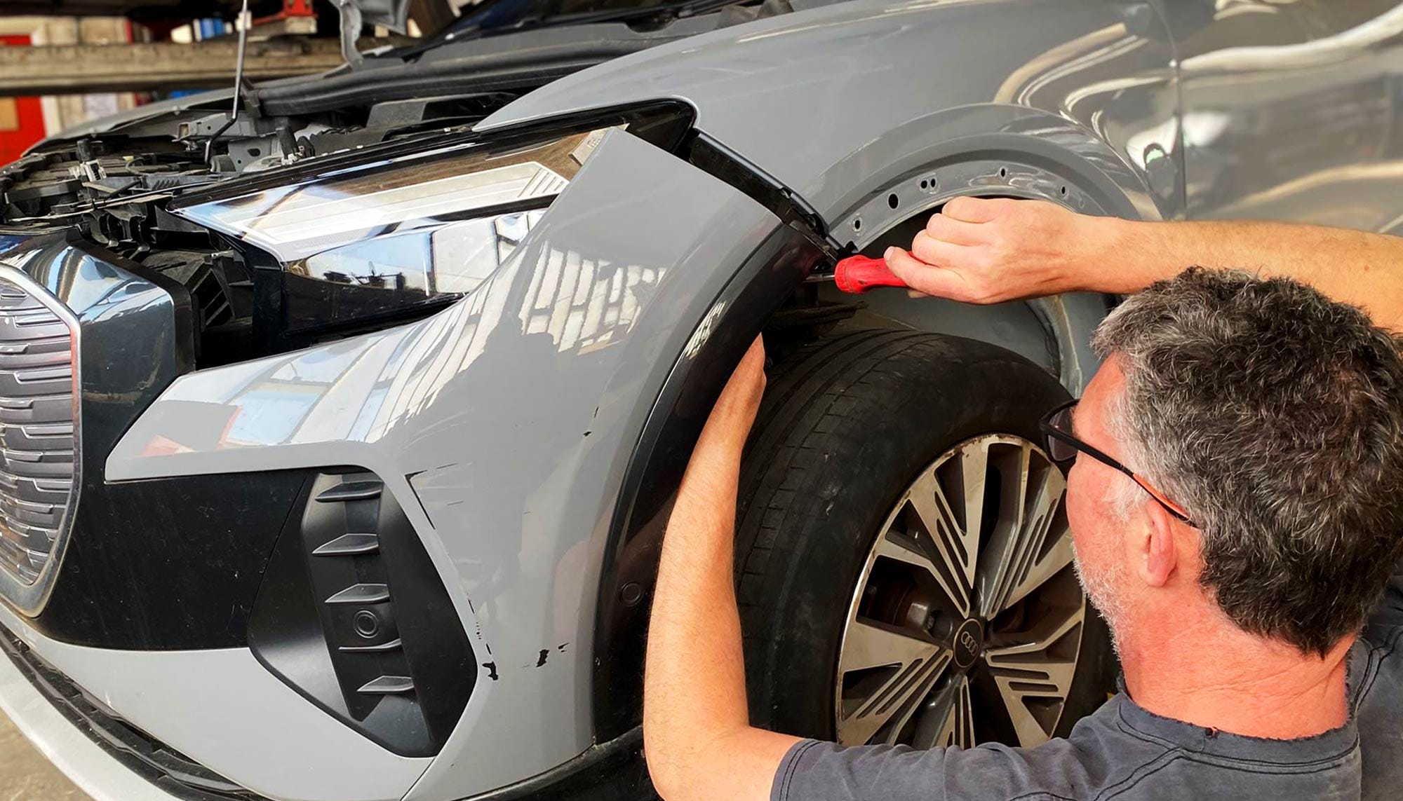 Mechanic working on car
