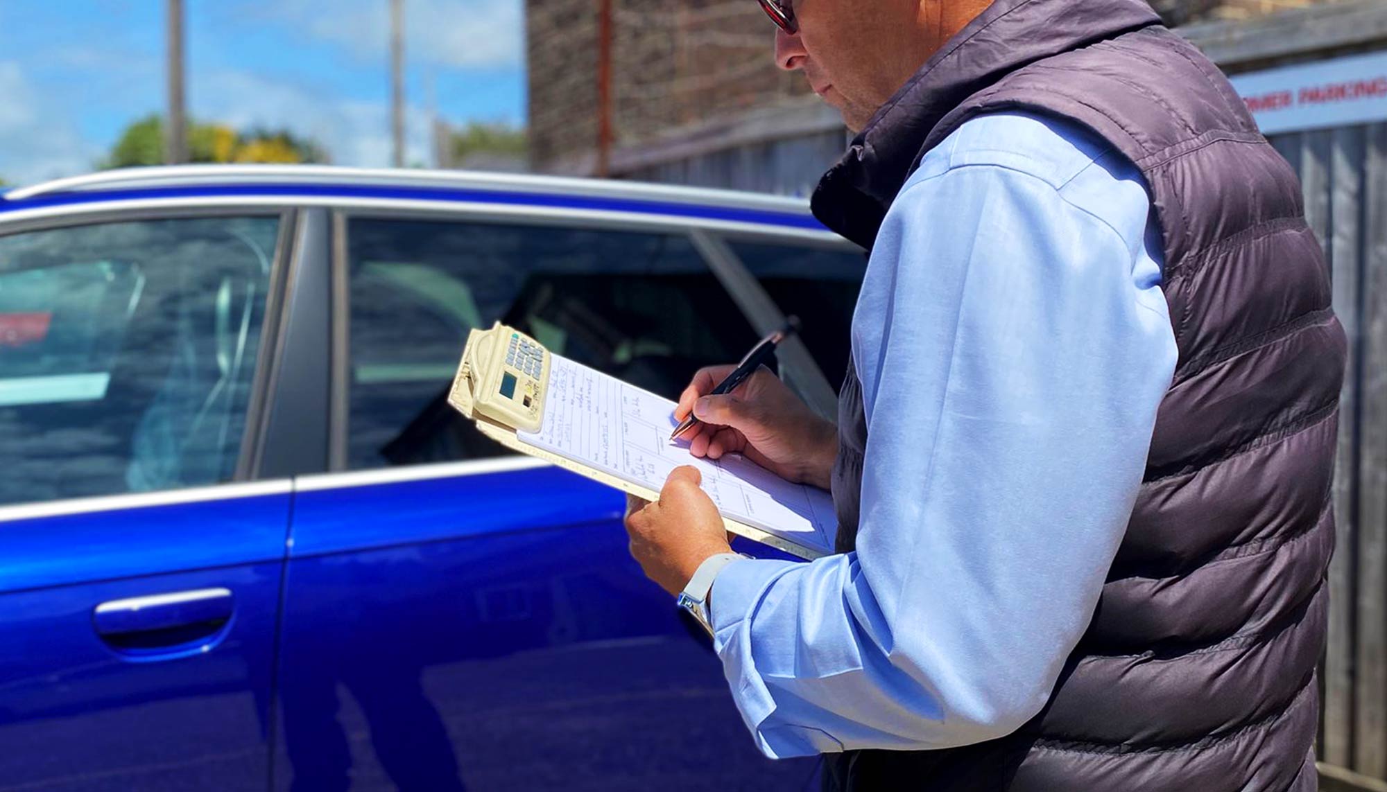 Technician looking at a clipboard